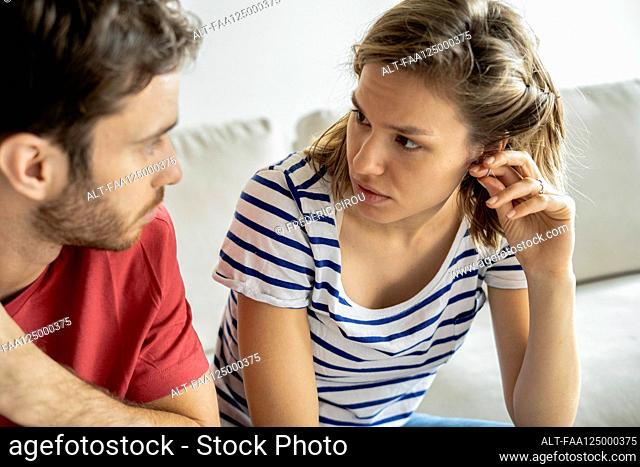Young couple talking with each other