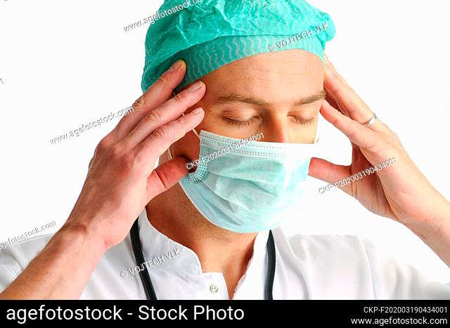 Coronavirus Ilustration, young doctor in cap and mask having an headache, COVID - 19