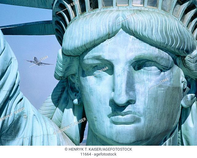 Statue of Liberty with plane. New York City. USA