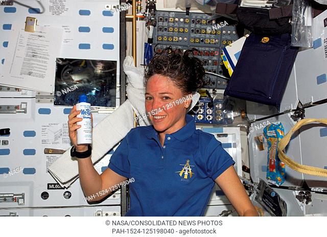 FILE: In this photo released by NASA, Astronaut Lisa M. Nowak, STS-121 mission specialist, washes her hair on the middeck of the Space Shuttle Discovery while...