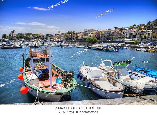 Summer view of the Port of Aci Trezza in Sicily Italy