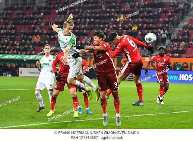 Tin JEDVAJ (FC Augsburg) heads the ball the goal for 2-0 versus Dawid KOWNACKI (Fortuna Dusseldorf) and Alfredo MORALES (Fortuna Dusseldorf)
