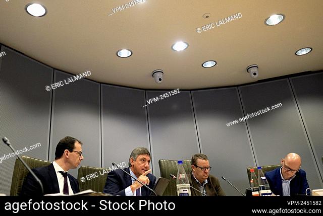 Flemish Minister of Welfare Wouter Beke (L) and Flemish Minister President Jan Jambon (2L) pictured during a hearing of the commission for welfare