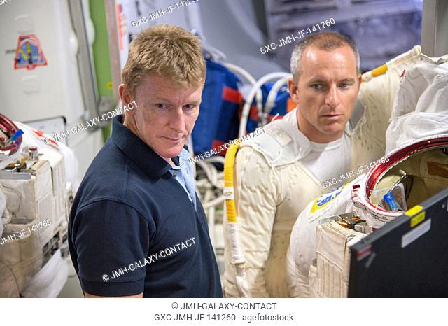 European Space Agency astronaut Timothy Peake (left), Expedition 4647 flight engineer; and Canadian Space Agency astronaut David Saint-Jacques participate in a...