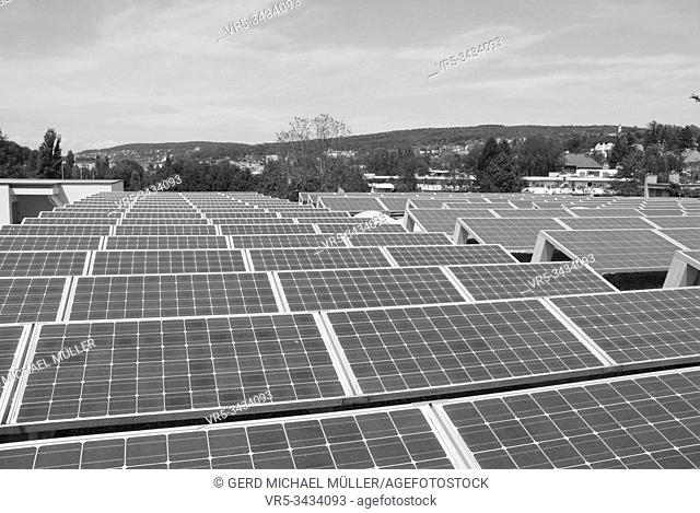 Switzerland: Solarenergy panels on the roof of a indurstrial building