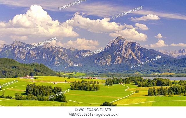 Scenery in Bavaria with mountains and lake, close view over the Hopfensee at the direction of Säuling, to the Hausberg of Füssen