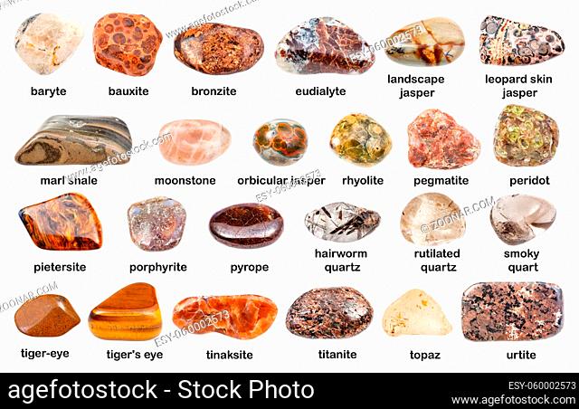 collection of various brown gemstones with names (pietersite, pyrope, jasper, bauxite, topaz, baryte, rhyolite, tiger-eye, marl, eudialyte, tinaksite