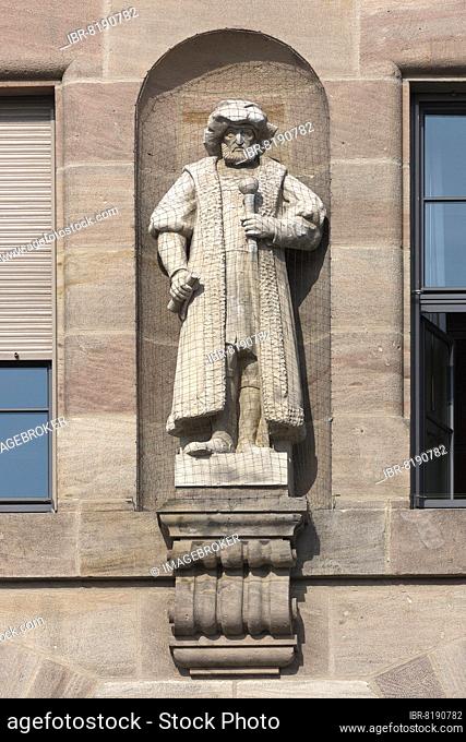 Stone sculpture by Johann Freiherr zu Schwarzenberg, 16th century historical jurist, main façade of the Justice Building, Nuremberg, Middle Franconia, Bavaria
