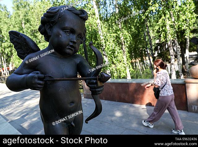 RUSSIA, KHANTY-MANSIYSK - JUNE 5, 2023: A cupid sculpture stands in Boris Losev Park. Donat Sorokin/TASS