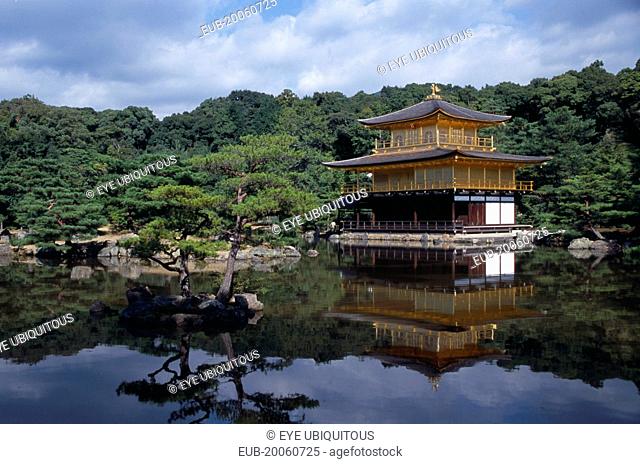 Kinkaku Ji Temple aka the Golden Pavilion seen over pond