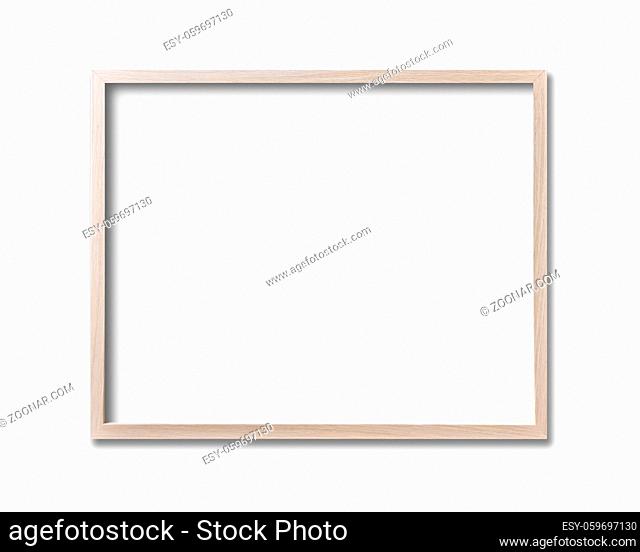 Wooden picture frame hanging on a white wall. Blank mockup template