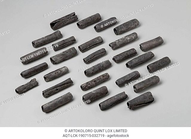 Lead role from the wreck of the East Indies ship 't Vliegend Hart, Lead plates rolled into tubes. Black-gray and silver-gray in color