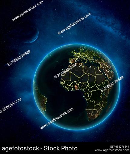 Togo at night from space with Moon and Milky Way. Detailed planet Earth with city lights and visible country borders. 3D illustration