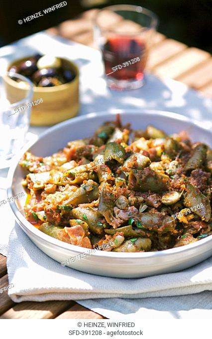 Tapas: bean stew, pickled olives Spain