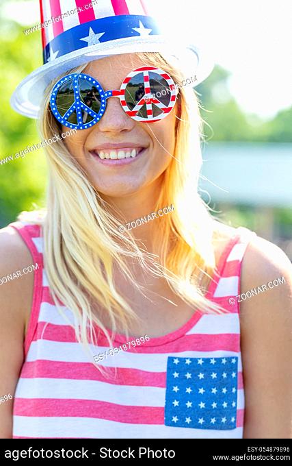 A patriotic blonde model having fun during the 4th of July holiday