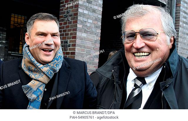 Former boxing pro and world champion Dariusz Michalczewski (L) and Promoter Ebby Thust smile after the funeral service of late boxing coach Fritz Sdunek in...