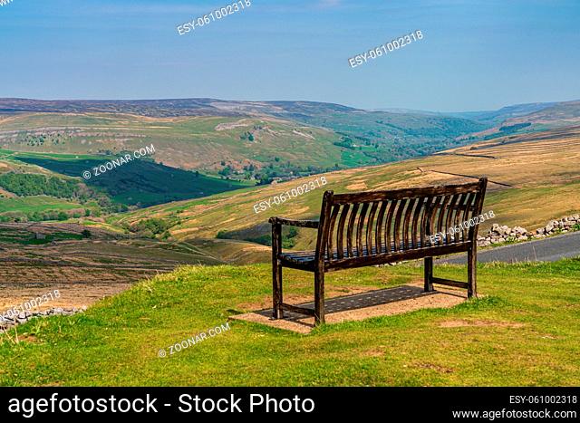 A bench with a view, seen at the Buttertubs Pass (Cliff Gate Rd) near Thwaite, North Yorkshire, England, UK
