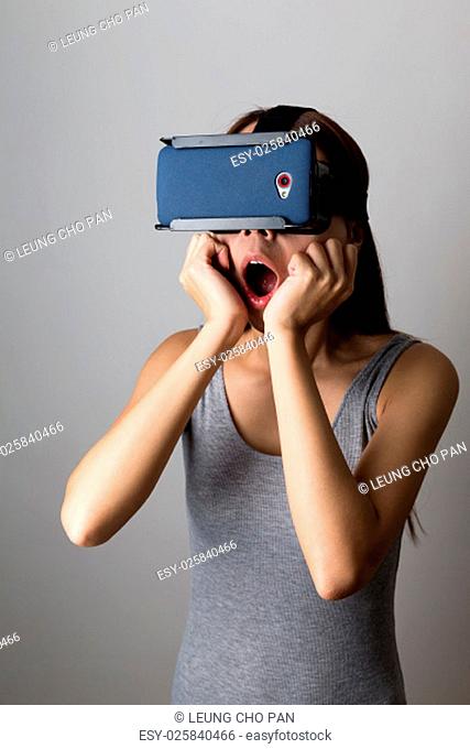 Woman feeling shocking when using the vr device