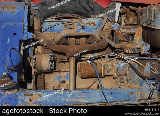 Rusty engine of tractor, Rusty bonnet of tractor, Tractor on scrap yard, Metal recycling, Recycling of scrap metal, Metal recycling, Sustainability