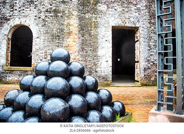 Huge stacks of canon balls on displays in an old Fort. Fort Macon State Park, originally called, Fort Dobbs then Fort Macon Military Reservation