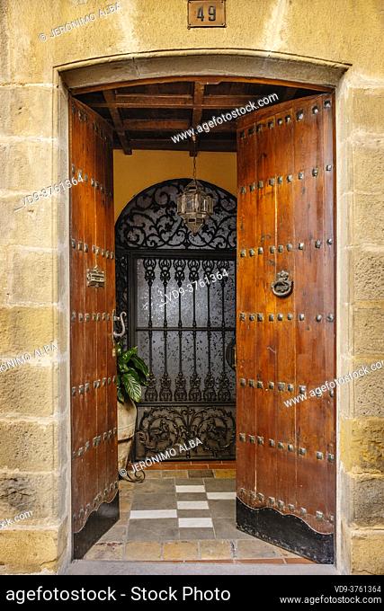 Entrance door to a palace house, Baeza, UNESCO World Heritage Site. Jaen province, Andalusia, Southern Spain Europe