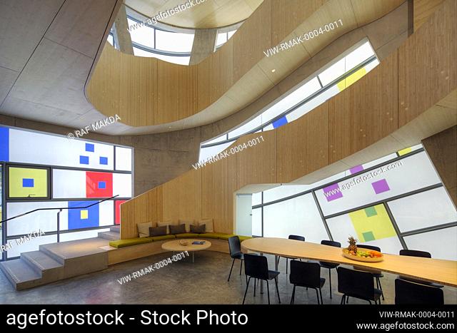 Staircase & atrium, curved glass facade. Maggies Centre, St Bartholomews Hospital, EC1A 7BC, United Kingdom. Architect: Steven Holl Architects, 2017