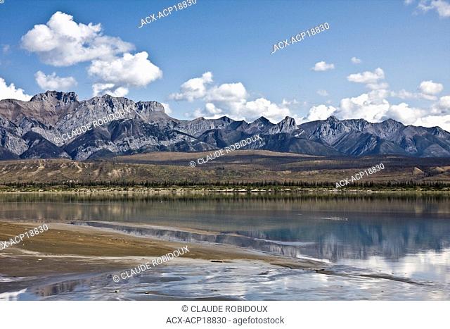 Canadian Rocky Mountains reflecting in Athabasca River in Jasper National Park, Alberta, Canada