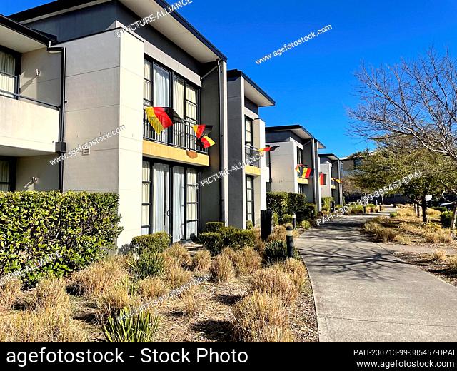 13 July 2023, Australia, Wyong: Soccer, World Cup, women, first training day of the German national team: German flags fly in front of the apartments of the...