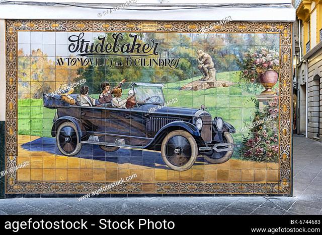 Old advertising Studebaker automobiles, painting from tiles with old car, Seville, Andalusia, Spain, Europe