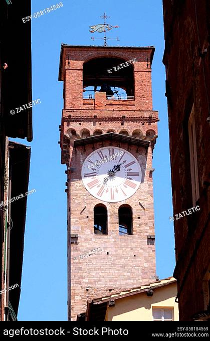 Torre dell'Orologio, Stone Bell Tower (Campanile) topped with brick arch and clock with roman numerals in Lucca, Italy