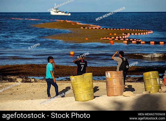PLAYA DEL CARMEN, MEXICO - JULY 4: General view of sargassum accumulated in the tourist area of the Fundadores Park beach in Playa del Carmen