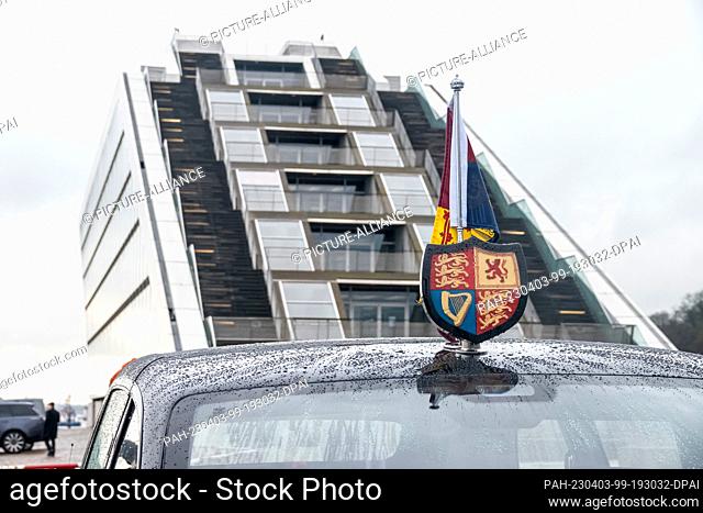 31 March 2023, Hamburg: A royal coat of arms can be seen on the Bentley State Limousine, the state coach of the British monarchs, at the port of Hamburg