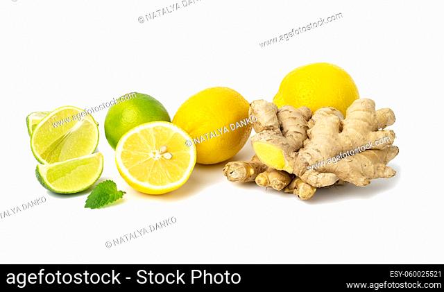 ginger root, lemon, lime and mint leaves on a white background. Vitamin C, anti-cold fruit