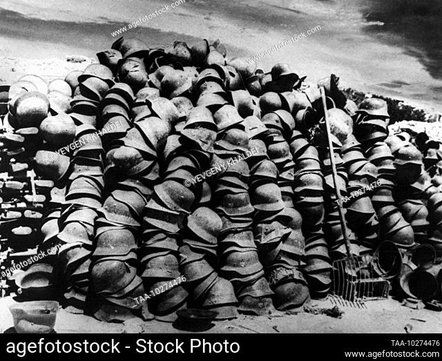 May, 1944. Sevastopol, Crimean ASSR, USSR. A view of a pile of Nazi German soldiers' helmets gathered after a battle during the Second World War