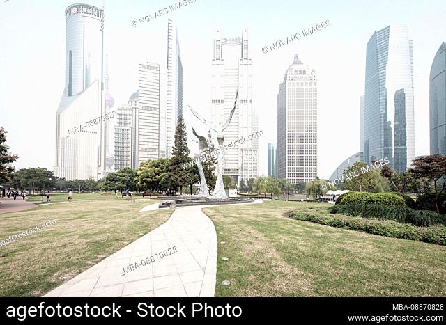 Sculptures and skyscrapers, Lujiazui Green Park, Lujiazui, Pudong, Shanghai, China