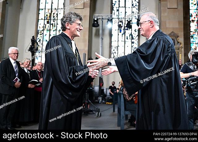 24 July 2022, Baden-Wuerttemberg, Stuttgart: Ernst-Wilhelm Gohl (l), the new Lutheran regional bishop for Württemberg, is inaugurated into office by his...