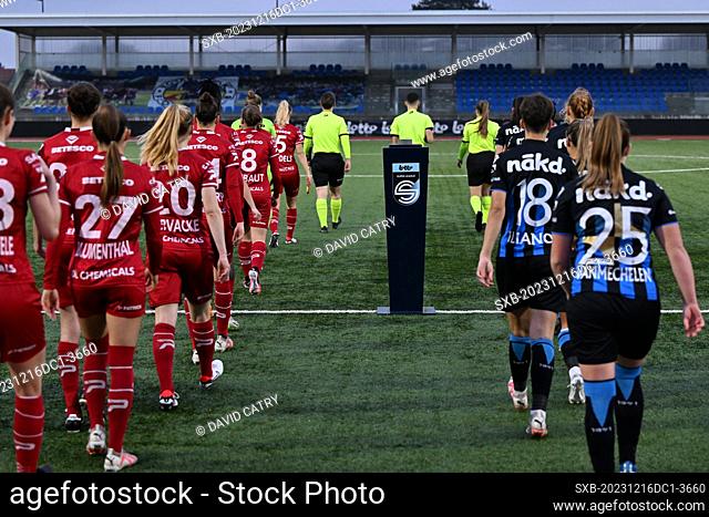 both teams pictured entering the pitch during a female soccer game between Club Brugge Dames YLA and SV Zulte - Waregem on the 12 th matchday of the 2023 - 2024...