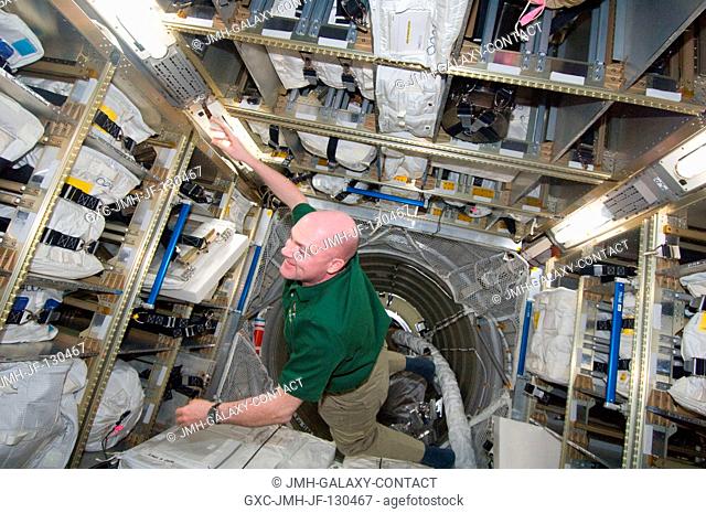 European Space Agency astronaut Andre Kuipers, Expedition 30 flight engineer, works in the Automated Transfer Vehicle (ATV-3) currently docked with the...