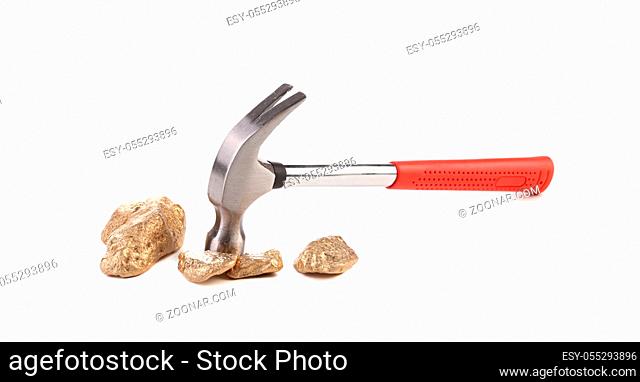 Closeup of hammer with rocks. Isolated on white background