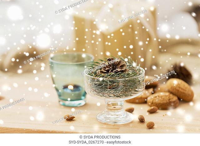 christmas fir decoration with cone in dessert bowl