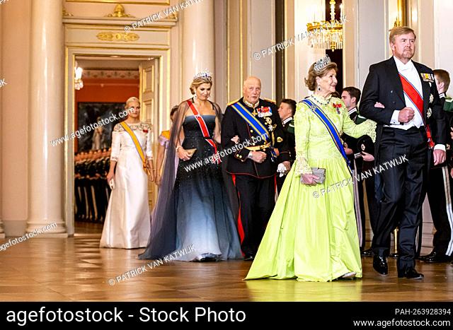 King Harald, Queen Sonja, Crown Prince Haakon and Crown Princess Mette-Marit host an official state banquet for King Willem-Alexander and Queen Maxima of The...