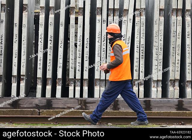 RUSSIA, ZAPOROZHYE REGION - DECEMBER 19, 2023: An employee is at work at a plant of reinforced concrete structures in the city of Berdyansk