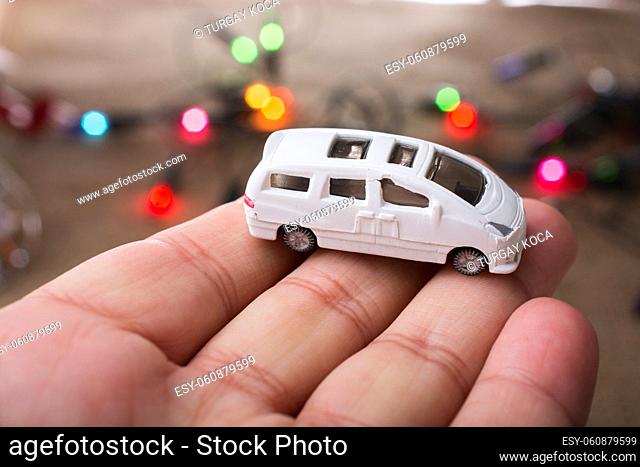 Toy car as a transportation device with lights behind