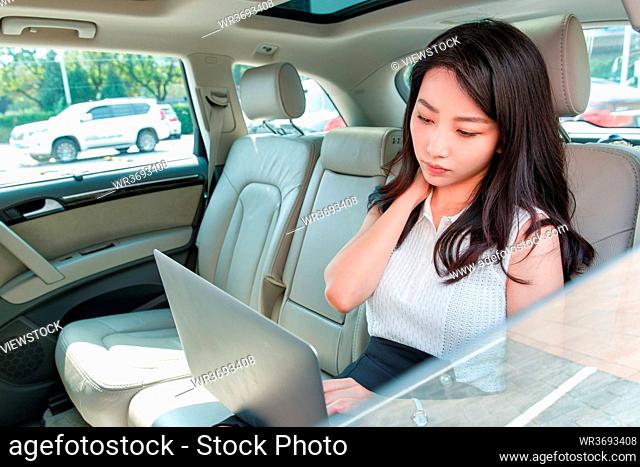 Inside the car tired business women