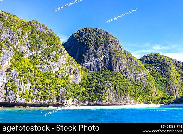 Beautiful famous beach lagoon panorama view between limestone rocks and turquoise water on Koh Phi Phi islands Ao Nang Krabi Thailand Southeast Asia