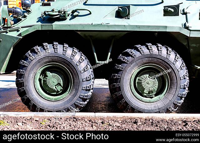 Samara, Russia - May 4, 2019: Close up view of BTR-82 army vehicles wheel with tire