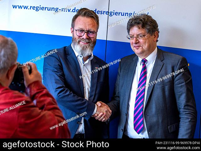 16 November 2023, Mecklenburg-Western Pomerania, Rostock: Claus Ruhe Madsen (l, CDU), Economics Minister from Schleswig-Holstein and Reinhard Meyer (r, SPD)