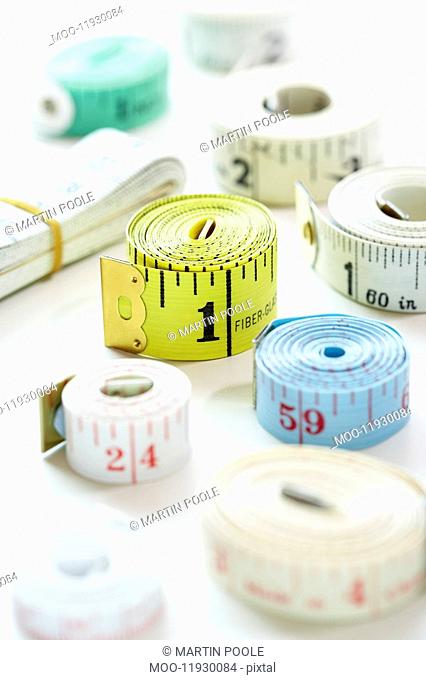 Rolls of measuring tape close-up
