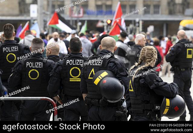12 October 2023, Saxony, Leipzig: Police officers secure a pro-Palestinian rally in the center of the city. The rally took place under the slogan ""Palestine -...