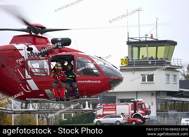 17 November 2023, Rhineland-Palatinate, Winningen: An Airbus H 145 helicopter takes off for winch training with a crew from the Rhineland-Palatinate police...